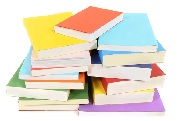 Untidy stack of colorful paperback books — Stock Photo, Image