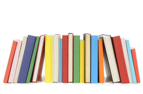 Row of colorful paperback books — Stock Photo, Image