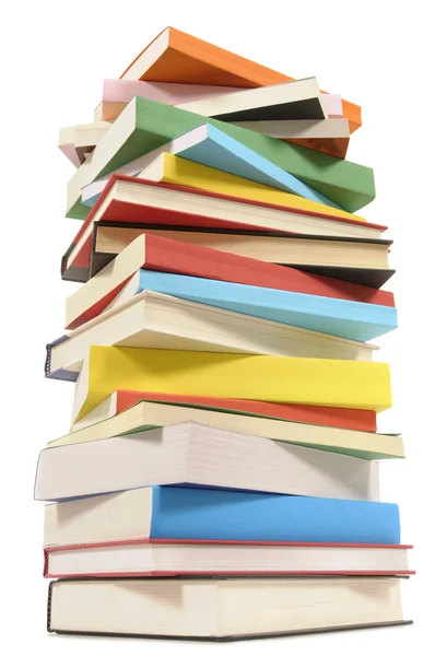 Very tall stack of colorful books — Stock Photo, Image