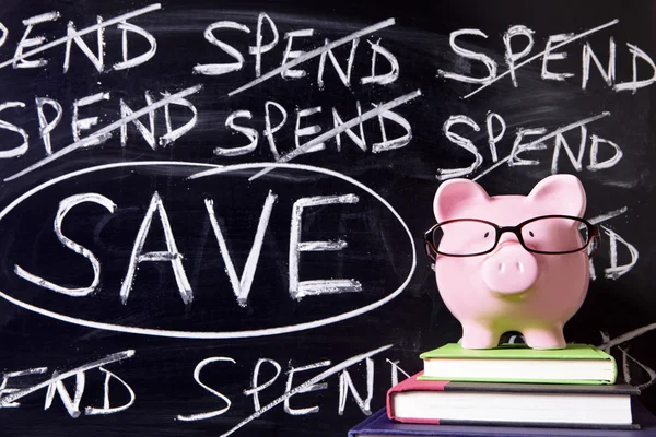 Piggy Bank com mensagem de poupança — Fotografia de Stock