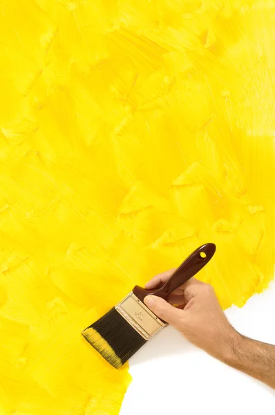 Partly painted yellow wall — Stock Photo, Image