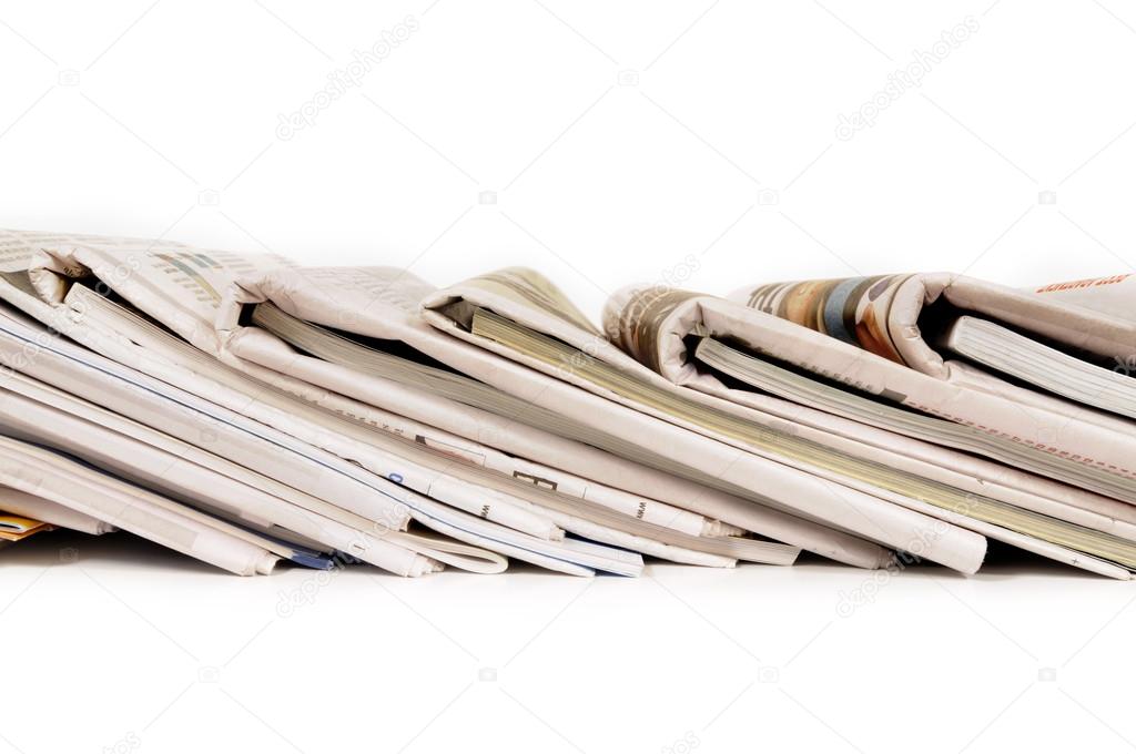 Row of folded newspapers