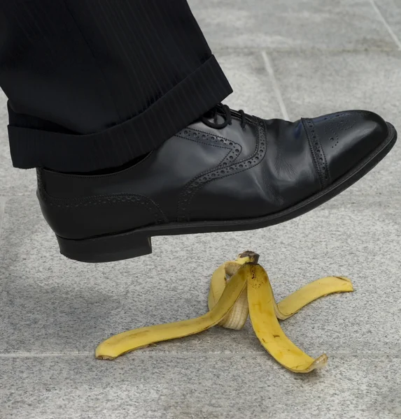 Empresário acidente banana — Fotografia de Stock