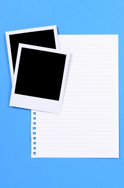 Blank photo prints with writing paper — Stock Photo, Image