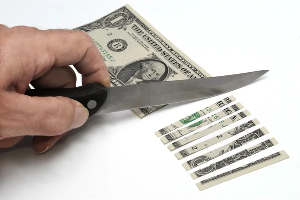 Доллар с ножом — стоковое фото