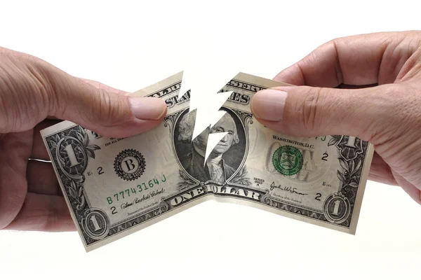 Dollar bill being torn in half — Stock Photo, Image