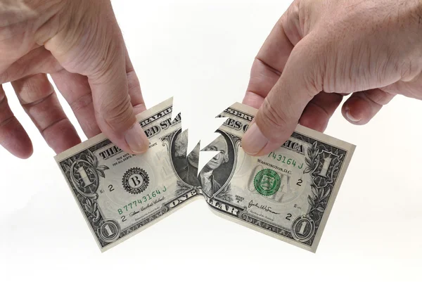 Dollar bill being torn in half — Stock Photo, Image