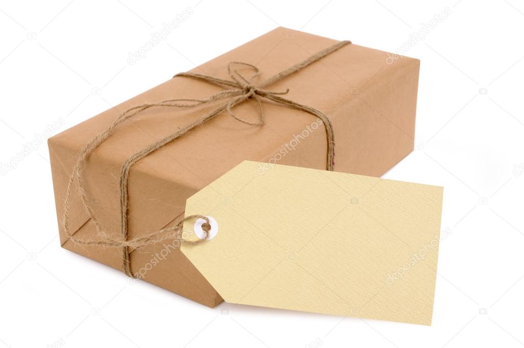 Thin brown paper package with oversize tag