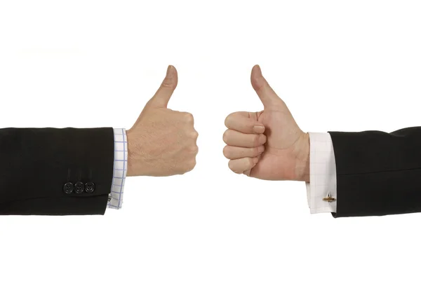 Two businessmen giving thumbs up signs. — Stock Photo, Image
