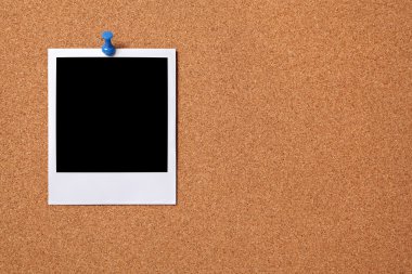 Blank photo pinned to a cork board clipart