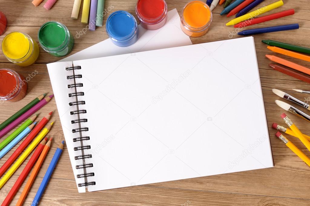 School supplies with blank art book