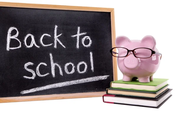 Piggy Bank with back to school message — Stock Photo, Image