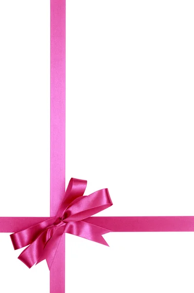 Pink gift ribbon bow isolated on white background vertical — Stock Photo, Image