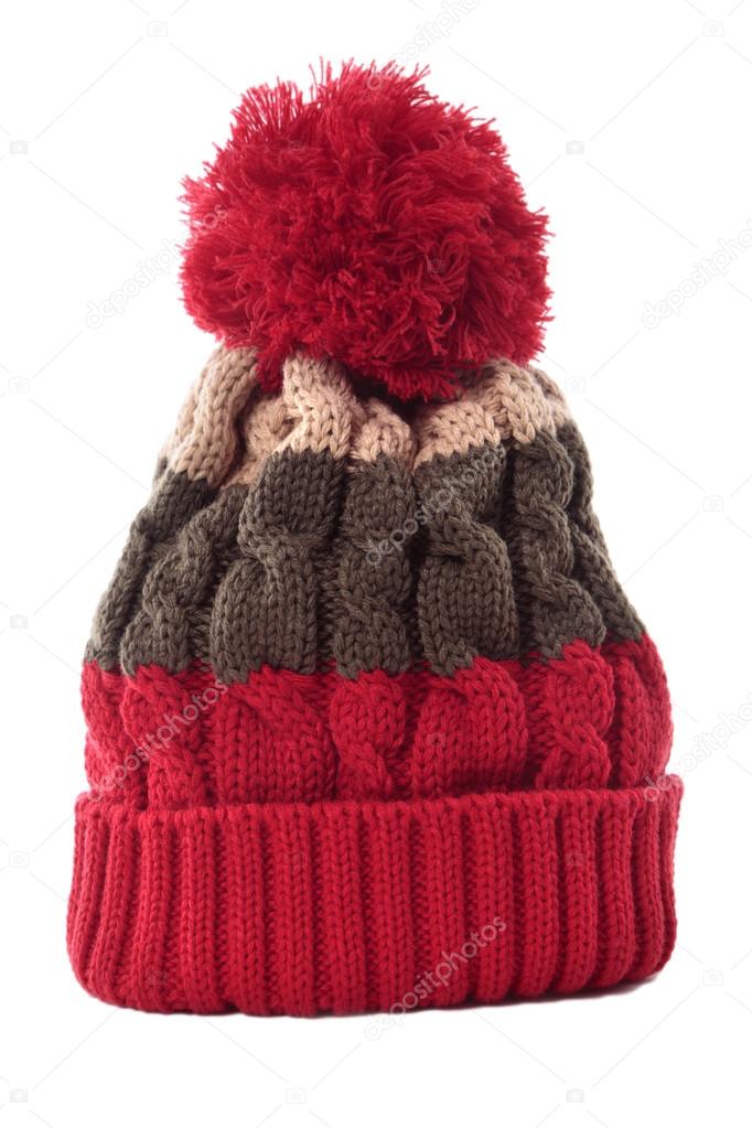 Red striped winter knitted bobble hat isolated vertical
