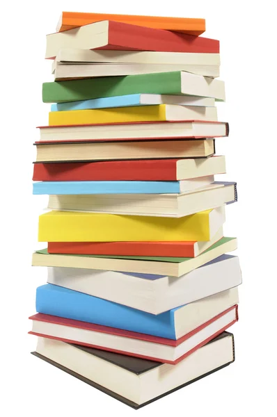 Very tall pile of books isolated on white background — Stock Photo, Image