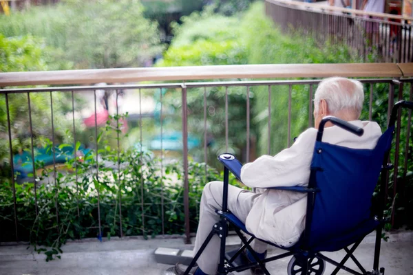 Old man sit on wheelchair — Stock Photo, Image