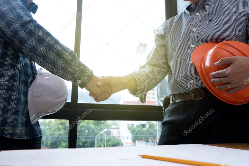 Architect or engineer hand shake 