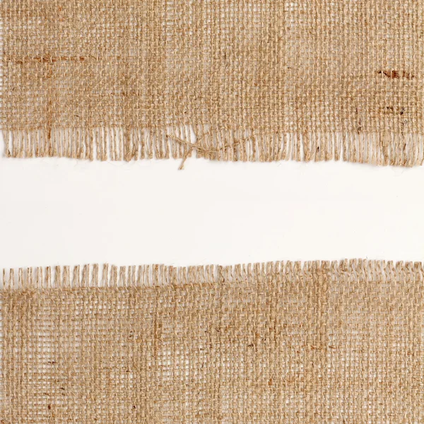 Texture of Burlap hessian square with frayed edges on white background — Stock Photo, Image