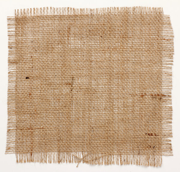 texture of Burlap hessian square with frayed edges