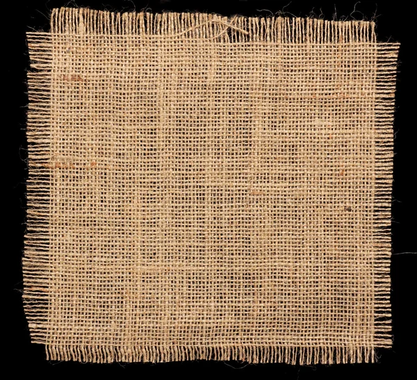 Texture of Burlap hessian on black background — Stock Photo, Image