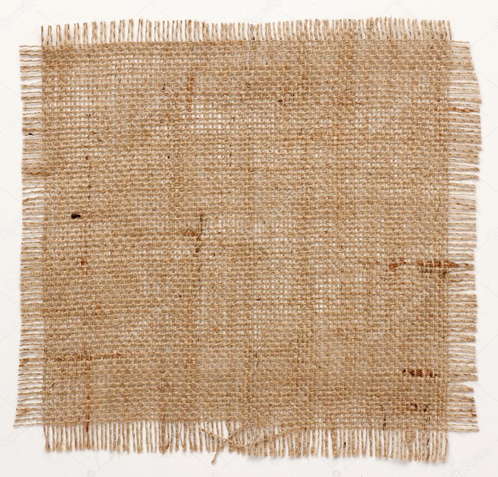 texture of Burlap hessian square with frayed edges