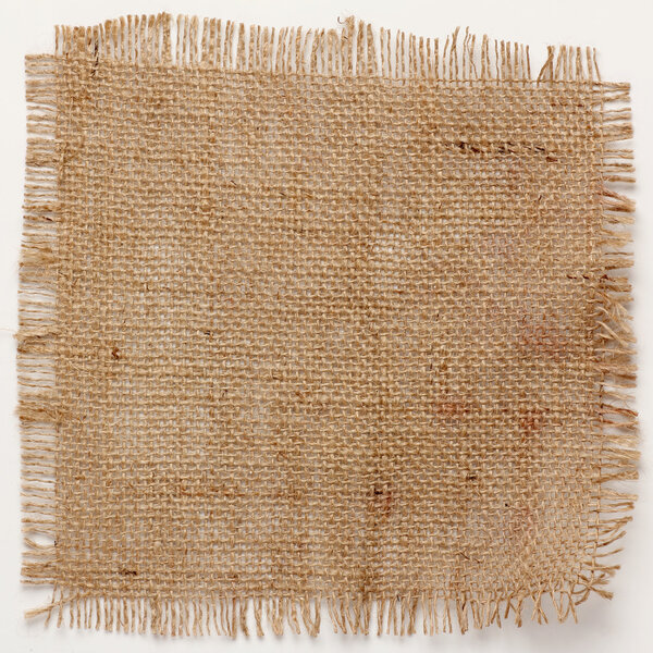 texture of Burlap hessian square with frayed edges