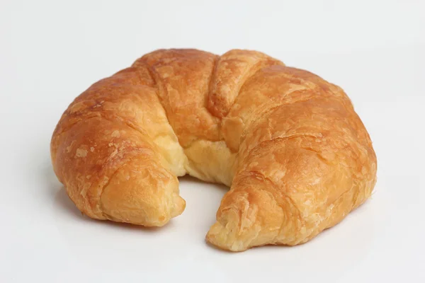 Un croissant glod marrón aislado — Foto de Stock