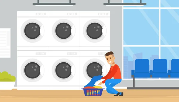 Öffentlicher Waschsalon mit Waschmaschinen, Mann lädt Kleidung zum Waschen und Trocknen Cartoon Vector Illustration — Stockvektor