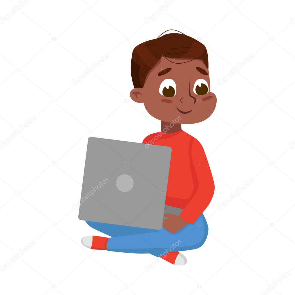 Cute Little Boy Sitting on Floor with Crossed Legs Using Laptop Computer, Online Education or Course, Kid Programmer Character Cartoon Style Vector Illustration