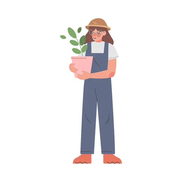Mujer agricultora Planta de tenencia en maceta, Mujer agricultora jardinero personaje en overoles Plantas de cultivo Dibujos animados Estilo Vector Ilustración — Archivo Imágenes Vectoriales