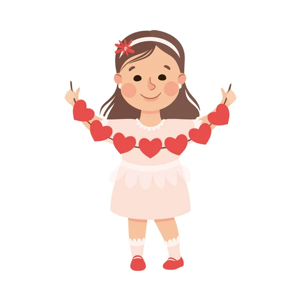 Linda chica sosteniendo banderas de fiesta en forma de corazones, Adorable personaje infantil con el símbolo de sentimientos románticos, Happy Valentines Day Concept Cartoon Vector Illustration — Vector de stock