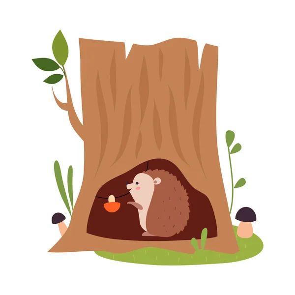 Funny Hedgehog as Forest Animal Reserving Mushrooms in Tree Hollow Vector Illustration — Stockvektor