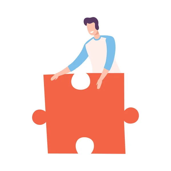 Jovem Homem Conectando Elemento Puzzle, Guy Segurando Big Red Jigsaw Piece Assembling Quebra-cabeça abstrato Desenhos animados Estilo Vetor Ilustração — Vetor de Stock