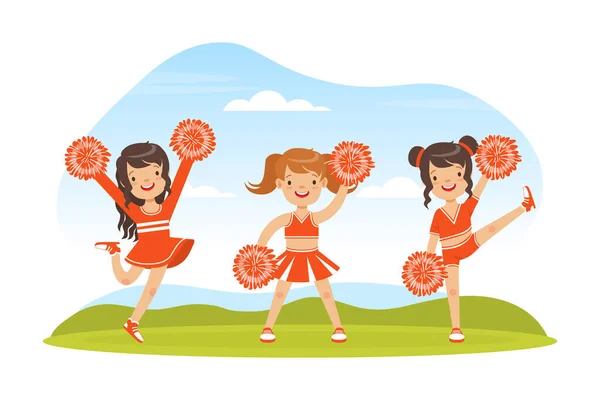 Cheerleading Team of Girls Dancing Together with Pom Poms Outdoors, Girls in Red Uniform Performing on Football Stadium Vector Illustration — Stock Vector