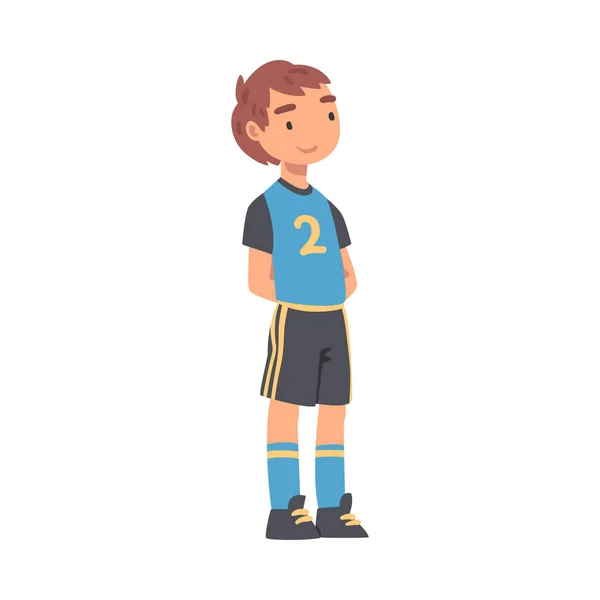 Personaje del jugador de fútbol infantil, niño en uniforme deportivo negro y azul jugando fútbol en la escuela Deportes Equipo Dibujos animados Estilo Vector Ilustración — Archivo Imágenes Vectoriales