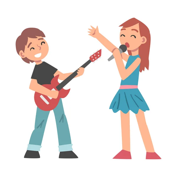 Cute Boy Playing Electric Guitar and Girl Singing with Microphone, Kid Learning to Play Musical Instrument Cartoon Style Vector Illustration — Vettoriale Stock