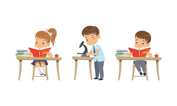 Cute Kids Studying at School Set, Elementary School Students in School Uniform Reading Books and Looking through Microscope Cartoon Vector Illustration — Image vectorielle