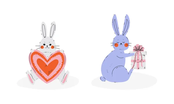 Şirin Tavşan ya da Uzun Kulaklı Tavşan Kalple Oturan ve Paketli Hediye Kutusu Vektörü Seti — Stok Vektör