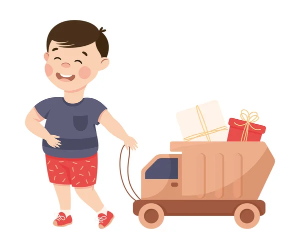 Petit garçon dans son enfance tirant camion jouet avec boîte cadeau Illustration vectorielle — Image vectorielle