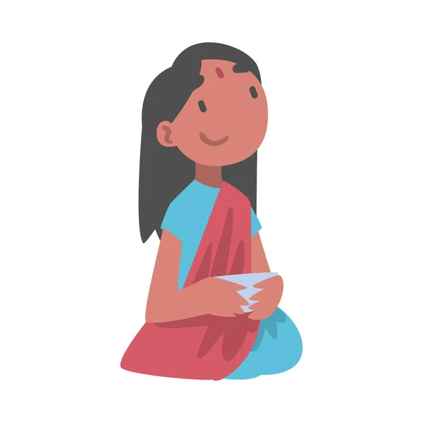 Indian Little Girl Wearing Sari med Bindi Sitting på gulvet, mens Bowl har Meal Vector Illustration – stockvektor