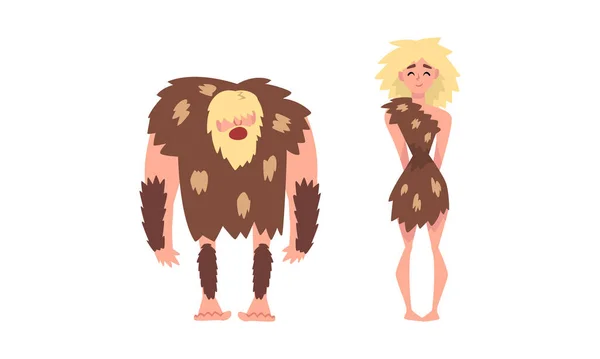 動物性皮膚ベクトルセットを身に着けている石器時代の原始的な男と女のキャラクター — ストックベクタ