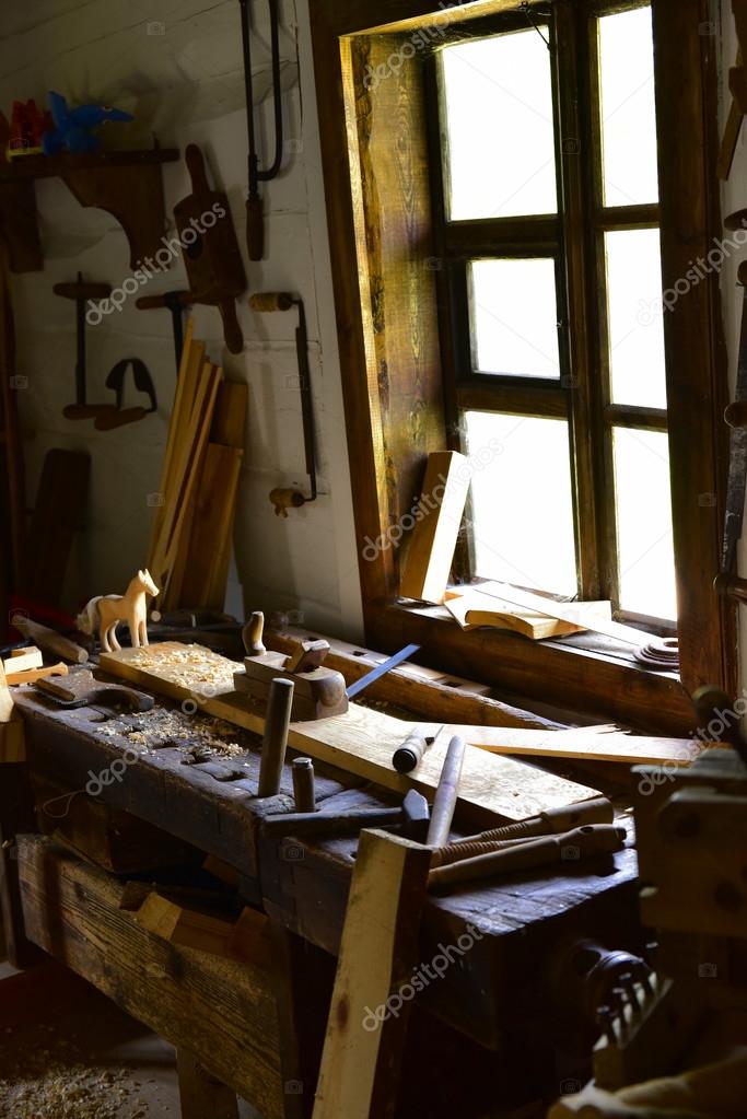 Vintage Wooden Drawing Desk In Carpenter Workshop At Window