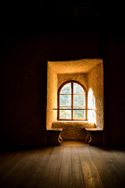 Light through the window in a medieval castle