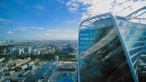 Skyscraper on the background of the city — Stock Video