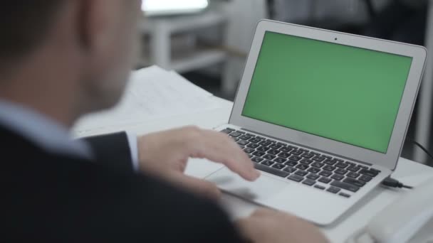 Man Uses Laptop In The Office — Stock Video