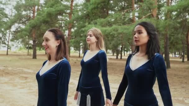 Close up of young women in costumes are dancing Irish dances — Stock Video