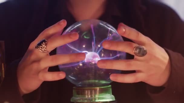 Close up of male fortune teller casts a spells and performs ritual with crystal ball — Stock Video