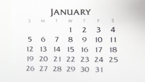 Női kéz kör nap naptár dátum egy piros marker. Üzleti alapok Falinaptár tervező és szervező. Január 1. — Stock videók