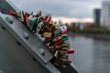 Padlocks on the Love Lock Bridge (Eiserner Steg, Iron Bridge) in Frankfurt am Main, Germany, having various names of love couples engrained in them