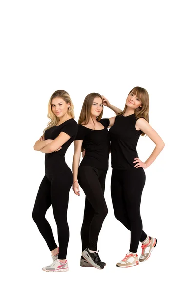 Three women slim and athletic isolated — Stock Photo, Image